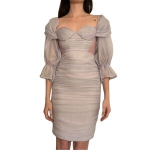 Periwinkle lilac frilly long sleeved mini dress with mesh paneling.